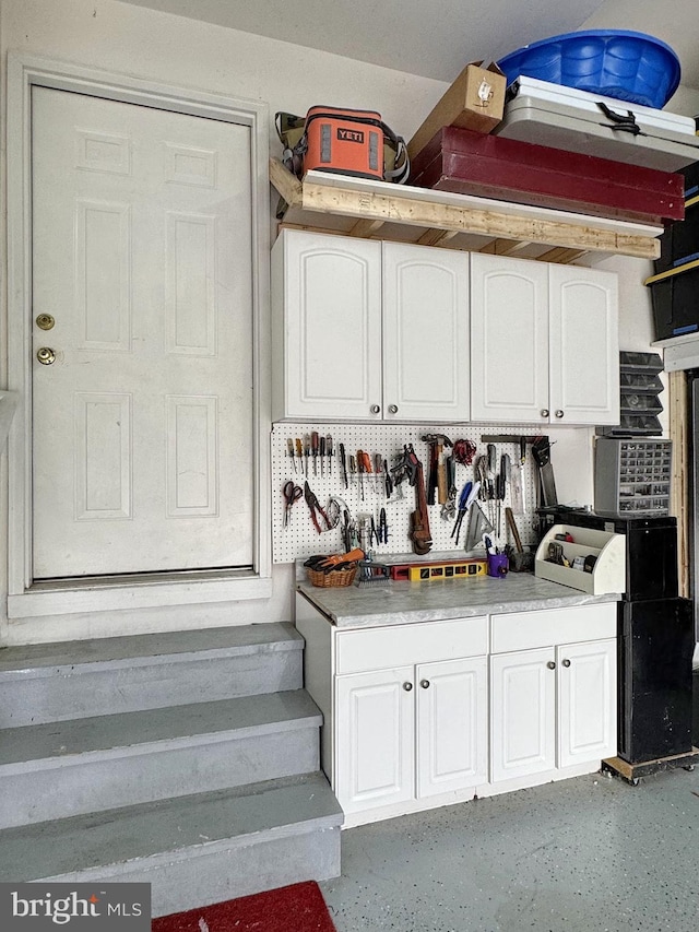 kitchen featuring white cabinets