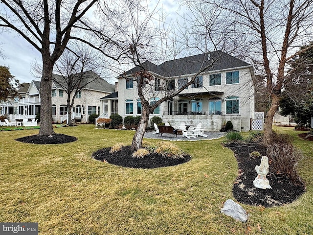 exterior space with a patio and a front yard