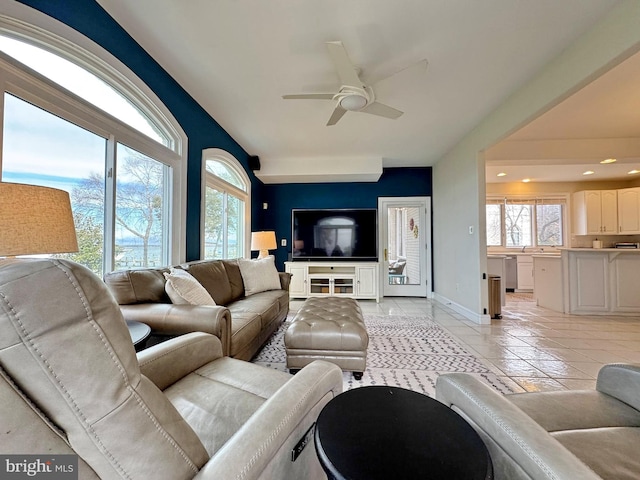 living room featuring ceiling fan