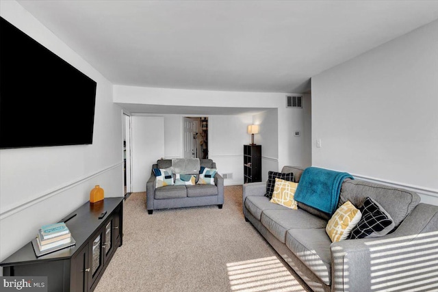 living room with light colored carpet