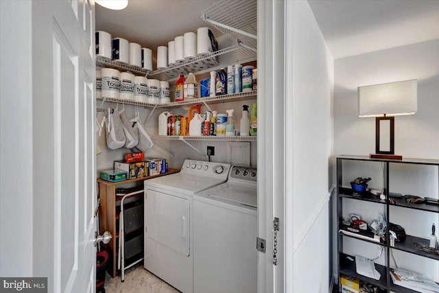 laundry room with washer and clothes dryer