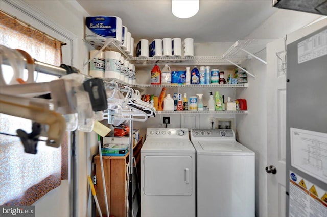 washroom featuring washer and clothes dryer