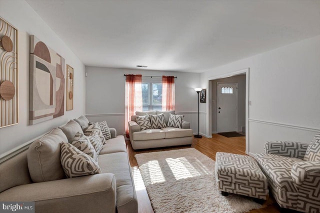 living room with hardwood / wood-style flooring