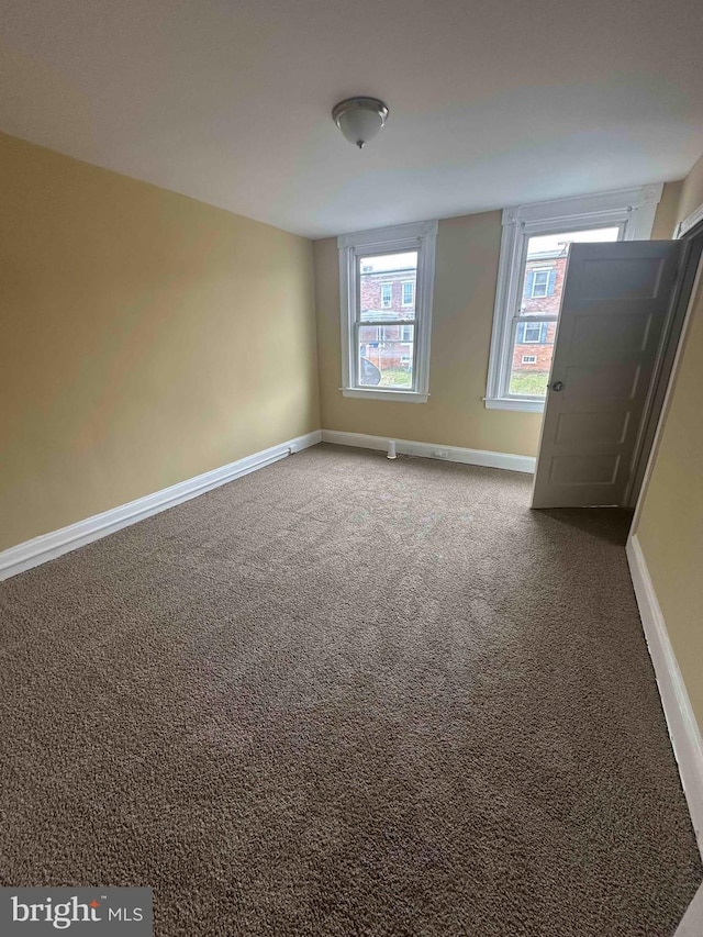 view of carpeted spare room