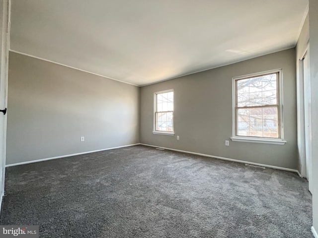 view of carpeted spare room