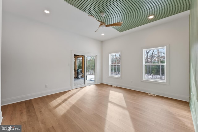 spare room featuring light hardwood / wood-style flooring