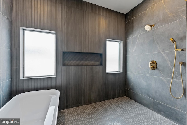 bathroom featuring a washtub