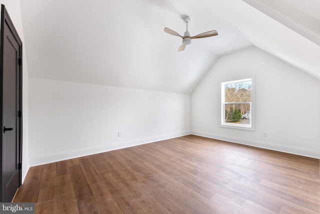 additional living space with lofted ceiling, ceiling fan, and light hardwood / wood-style flooring