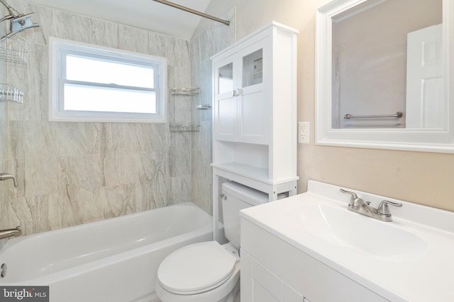 full bathroom featuring vanity, toilet, and tiled shower / bath combo