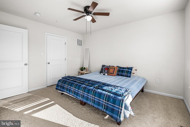 bedroom with carpet floors and ceiling fan