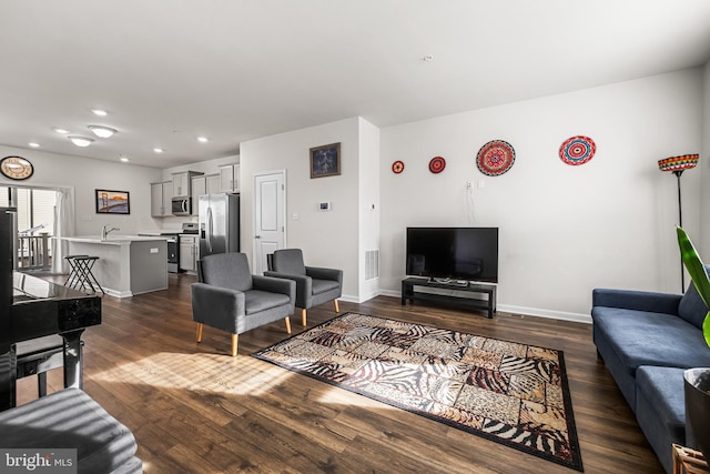 living room featuring dark hardwood / wood-style floors