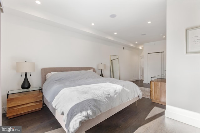 bedroom featuring dark wood-type flooring