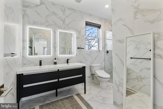 bathroom with vanity, toilet, and walk in shower