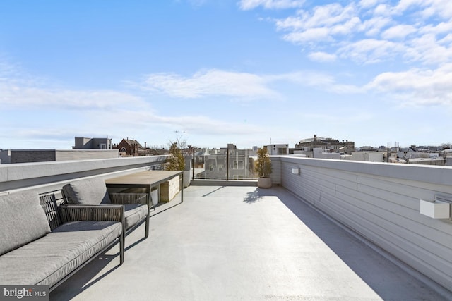 view of patio with a balcony