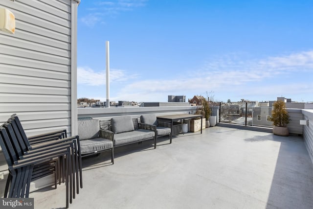 view of patio / terrace with a balcony