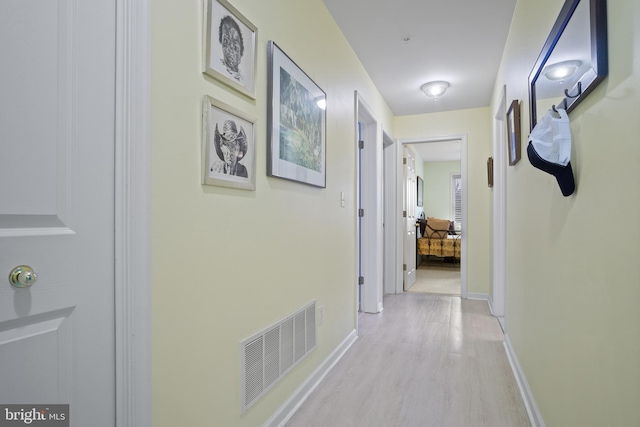 hall featuring light hardwood / wood-style flooring