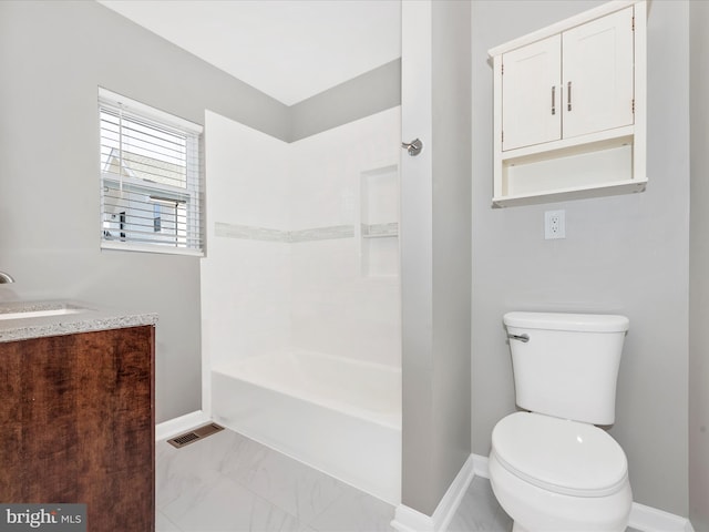 full bathroom featuring vanity, toilet, and shower / bath combination