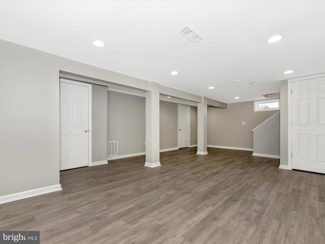 basement featuring hardwood / wood-style floors