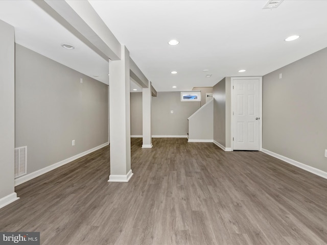 basement with wood-type flooring