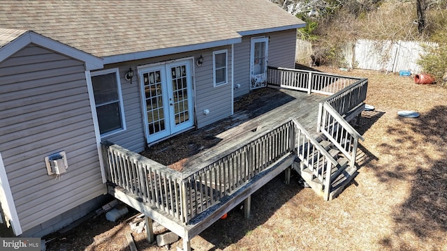 wooden terrace with french doors and fence