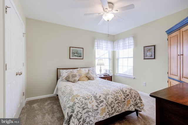 bedroom with ceiling fan and carpet