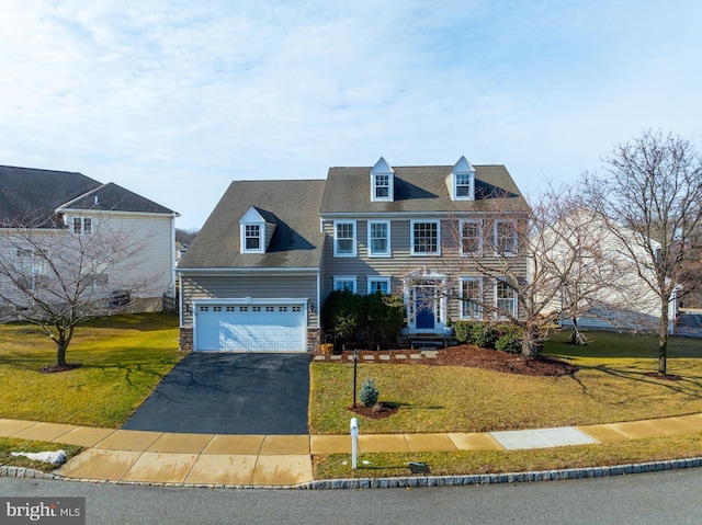 view of front facade featuring a garage and a front yard