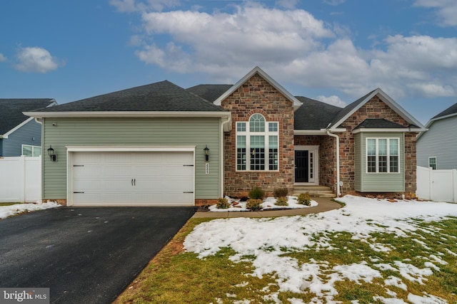 view of front of property featuring a garage