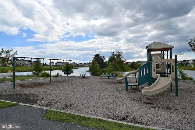 view of playground featuring a water view