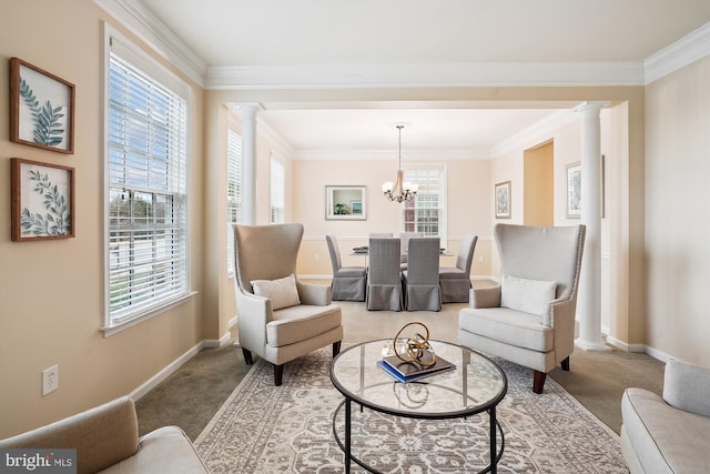 living room featuring ornamental molding, decorative columns, and carpet