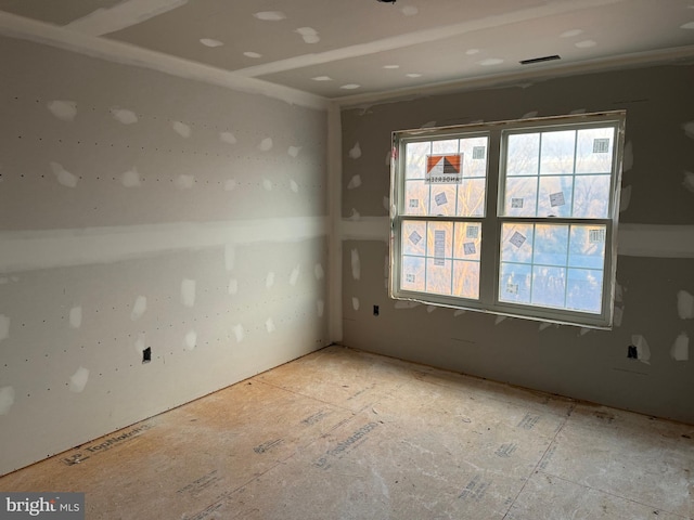 spare room featuring visible vents