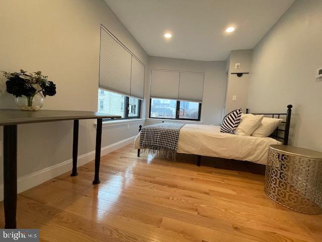 bedroom featuring light wood-type flooring