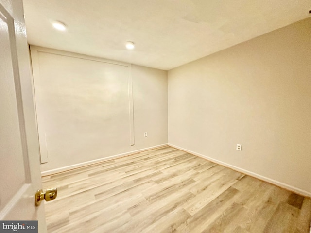 unfurnished room featuring hardwood / wood-style floors