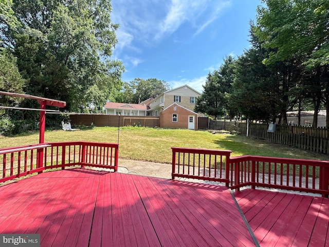 deck featuring a lawn