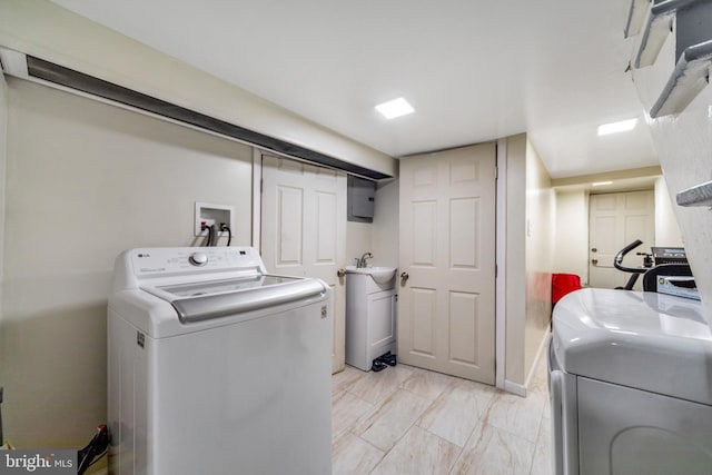 laundry area with sink and hookup for a washing machine