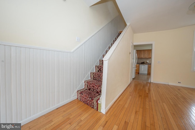 stairway with wood-type flooring