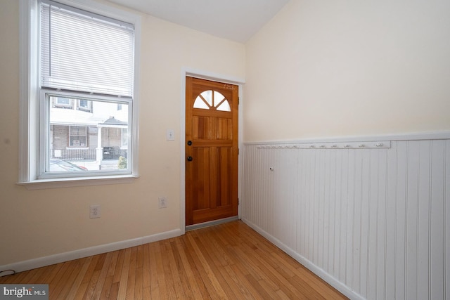 entryway with light hardwood / wood-style flooring