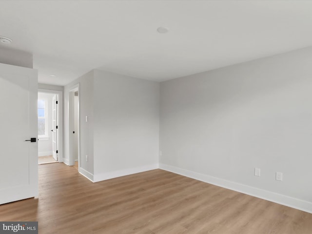 unfurnished room featuring light hardwood / wood-style flooring