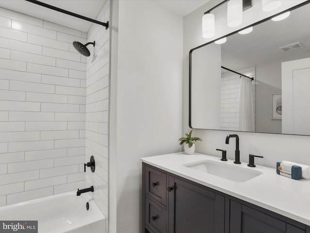 bathroom with vanity and shower / bath combo