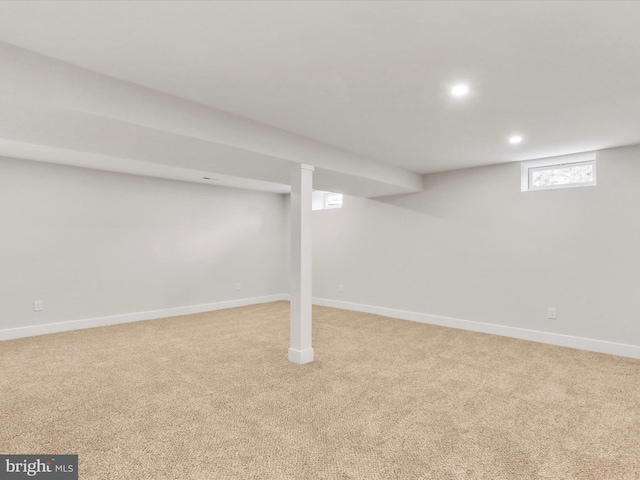 basement with light carpet