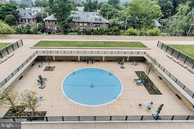 view of pool featuring a patio