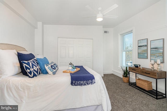 bedroom featuring ceiling fan, carpet flooring, and a closet