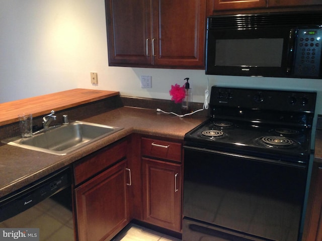 kitchen featuring sink and black appliances