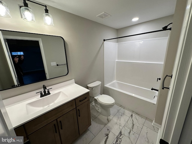 full bathroom featuring bathing tub / shower combination, vanity, and toilet