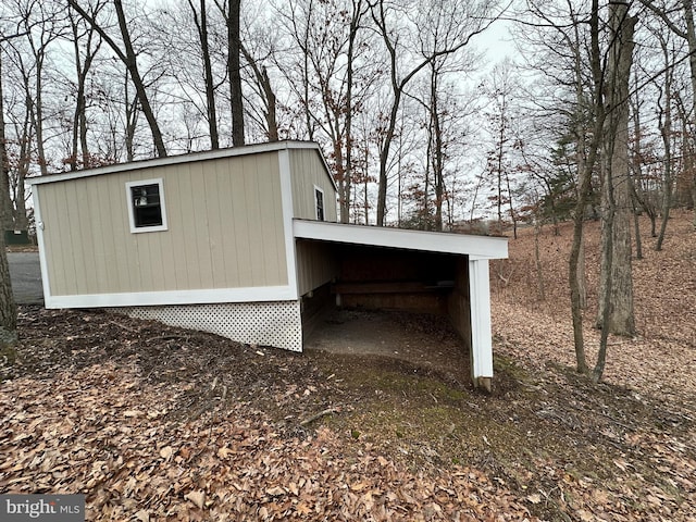 view of outdoor structure with a carport