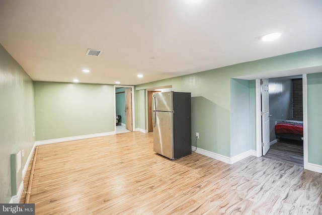 empty room featuring light hardwood / wood-style floors