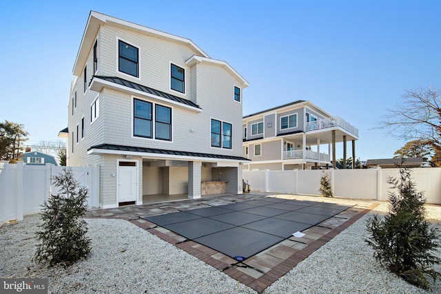 back of house featuring a patio area