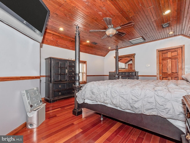 bedroom featuring lofted ceiling, wooden ceiling, and wood finished floors