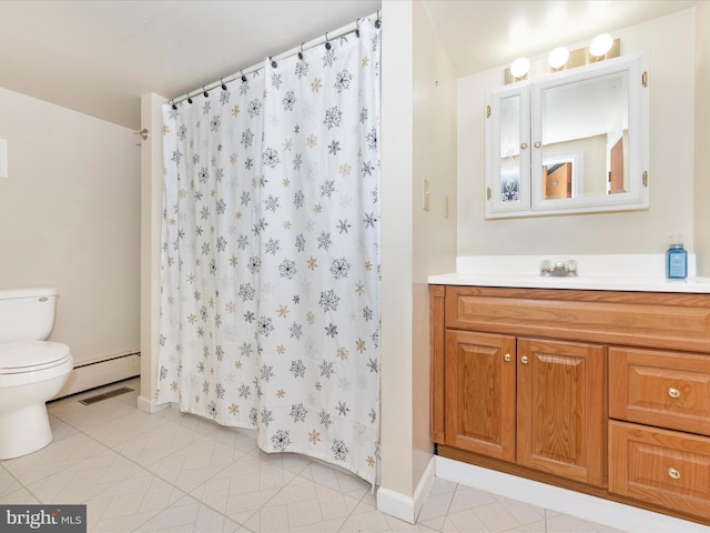 bathroom featuring visible vents, toilet, baseboard heating, vanity, and tile patterned flooring