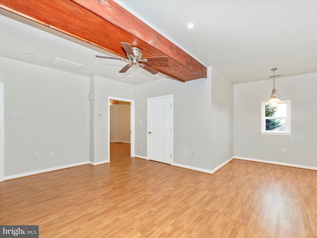 empty room featuring light wood-style floors, beamed ceiling, baseboards, and a ceiling fan