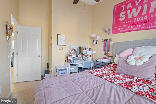 bedroom with ceiling fan and carpet flooring